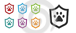 Black Animal health insurance icon isolated on white background. Pet protection concept. Dog or cat paw print. Set icons