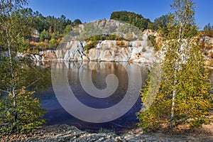 Black artificial lake and hills - mining and production of copper in Bor, Serbia