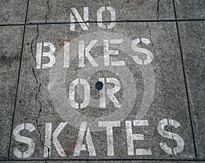 Black Asphalt White Text No Bikes or Skates