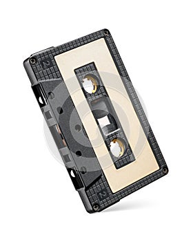 Black audio cassette tape isolated on white background