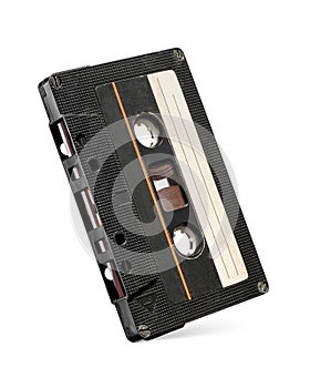 Black audio compact cassette tape isolated on white background. 80\'s mixtape symbol