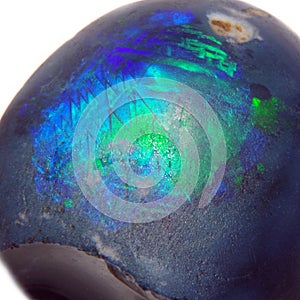 Black Australian opal on white background