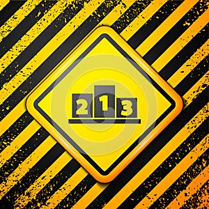 Black Award over sports winner podium icon isolated on yellow background. Warning sign. Vector Illustration