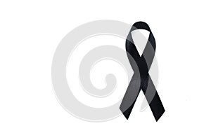 Black awareness ribbon. Melanoma and skin cancer prevention. Hea