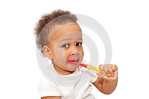 Black baby toddler brushing teeth. photo