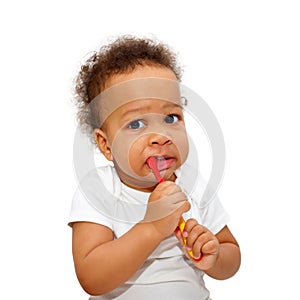 Black baby toddler brushing teeth.