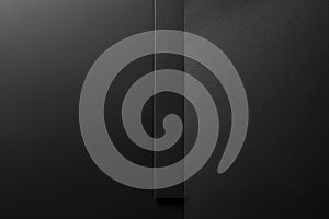 Black background, a flat rectangular piece of paper is placed on the right side of it, with a dark black gradient and a minimalis