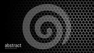 Black background with hexagonal mesh pattern design