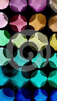 Black background of multicolored watercolor circles. Abstract composition of watercolor circles on a black background.