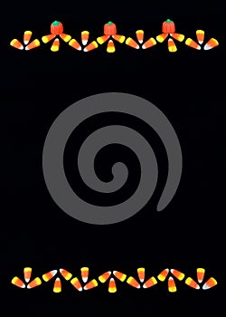 Black background with top and bottom border candy corn