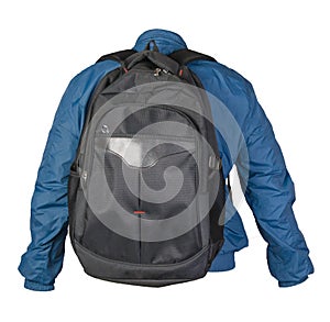 Black backpack dressed in a blue jacket isolated on a white background