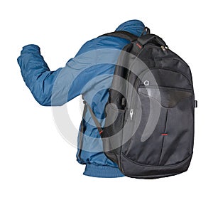 Black backpack dressed in a blue jacket isolated on a white background