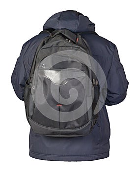 Black backpack dressed in a blue jacket isolated on a white background
