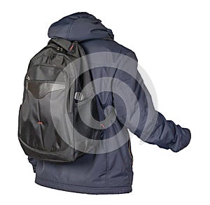 Black backpack dressed in a blue jacket isolated on a white background