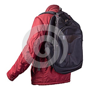 Black backpack dressed in a red jacket isolated on a white background