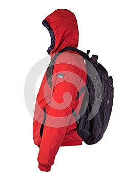 Black backpack dressed in a red jacket isolated on a white background