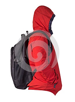 Black backpack dressed in a red jacket isolated on a white background