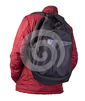 Black backpack dressed in a red jacket isolated on a white background