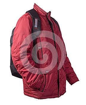 Black backpack dressed in a red jacket isolated on a white background