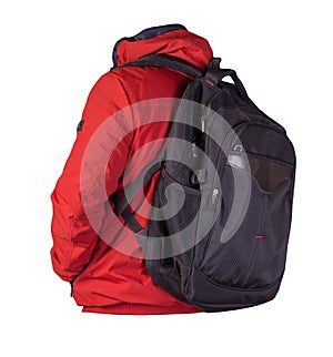 Black backpack dressed in a red jacket isolated on a white background