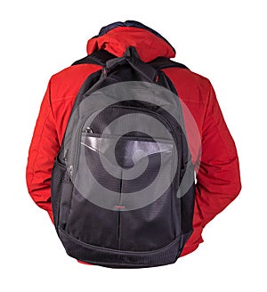 Black backpack dressed in a red jacket isolated on a white background