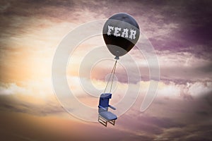 A black balloon that says FEAR carries an airplane chair demonstrating feelings of fight or flight anxiety concept . 3D.