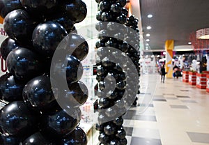 Black balloons in mall