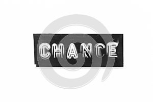 Black banner that have embossed letter with word chance on white paper background