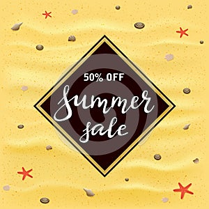 Black banner with lettering Summer Sale on the sandy beach