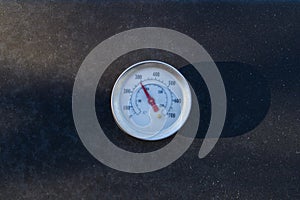Barbecue thermometer in the sun light
