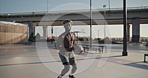 Black basketball player preparing to throw ball