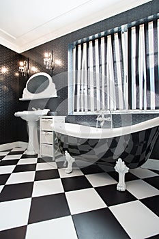 Black bathtub in contemporary bathroom