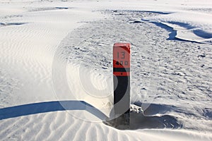 Black beach pole 13 400, Ameland Beach, Holland photo