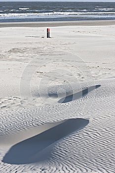 Black beach pole 14 200, Ameland Beach, Holland photo