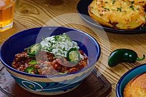 Black Bean Chili Con Carne in Bowl with Corn Bread