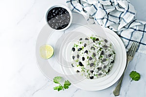 Black bean cilantro lime rice in a plate photo