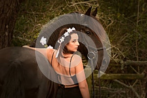 Black beauty horse and pretty woman