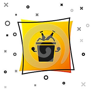 Black Beer bottles in ice bucket icon isolated on white background. Yellow square button. Vector