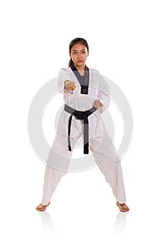 Black belt female fighter straight punch
