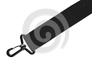 Black belt rope strap lanyard, hanging plastic clasp snap latch hook carabiner, isolated macro closeup, horizontal