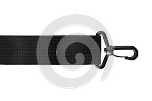 Black belt rope strap lanyard, hanging plastic clasp snap latch hook carabiner, isolated macro closeup horizontal, large detailed