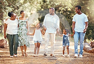 Black big family, love and a walk in nature, outdoors or outside on holiday, vacation or trip. African ancestry
