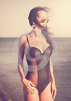 Black bikini sea, sunglasses, close up, toned