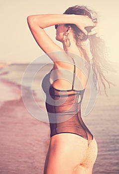 Black bikini sea, sunglasses, close up, toned