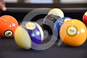 Black billiard table, Billiard balls in a pool table, out of focus balls