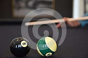 Black billiard table, Playing billiard - Close-up shot of a man playing billiard