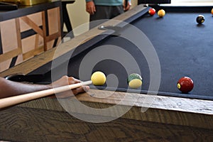 Black billiard table, Playing billiard - Close-up shot of a man playing billiard