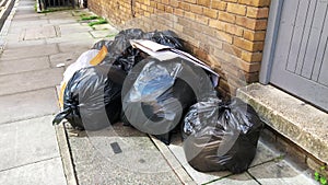 Black bin bags and waste not collected due to a Tower Hamlets council waste service strike.