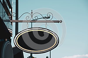 black blank circle signboard on street