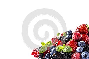 Black-blue and red food on a white. Ripe blackberries, blueberries, currants, raspberries, strawberries with mint on a white backg